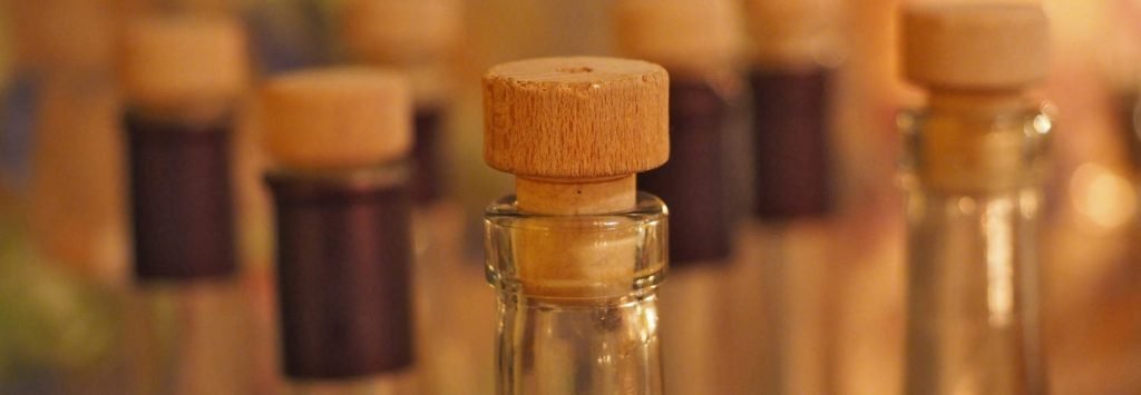 Grappa sarda filu 'e ferru in bottiglie di vetro con tappo di sughero